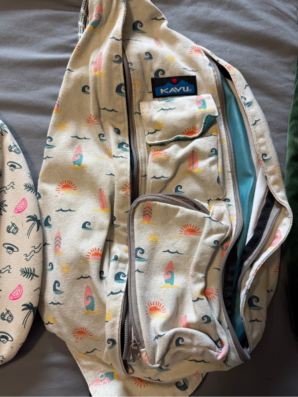 Kavu Cream Canvas Sling Bag with Teal, Coral & Yellow Surf Print